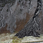 Wildlife trail, snow dusted moraine, Karo La Pass, Tibet